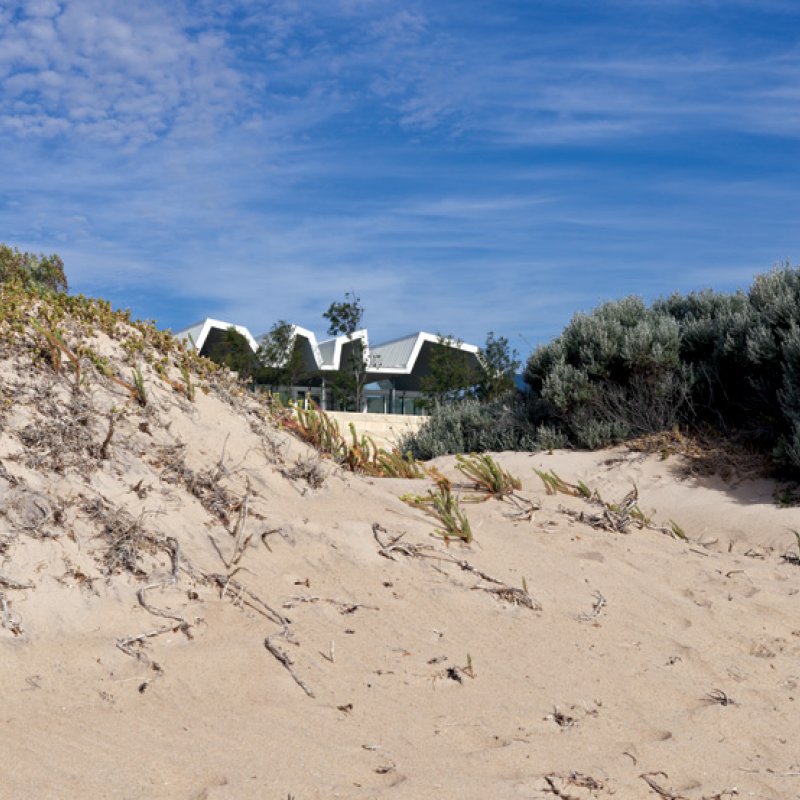 It's the striking form of this house that sets it apart from its milieu - especially the pitched and folding roof line that provides differing ceiling heights.